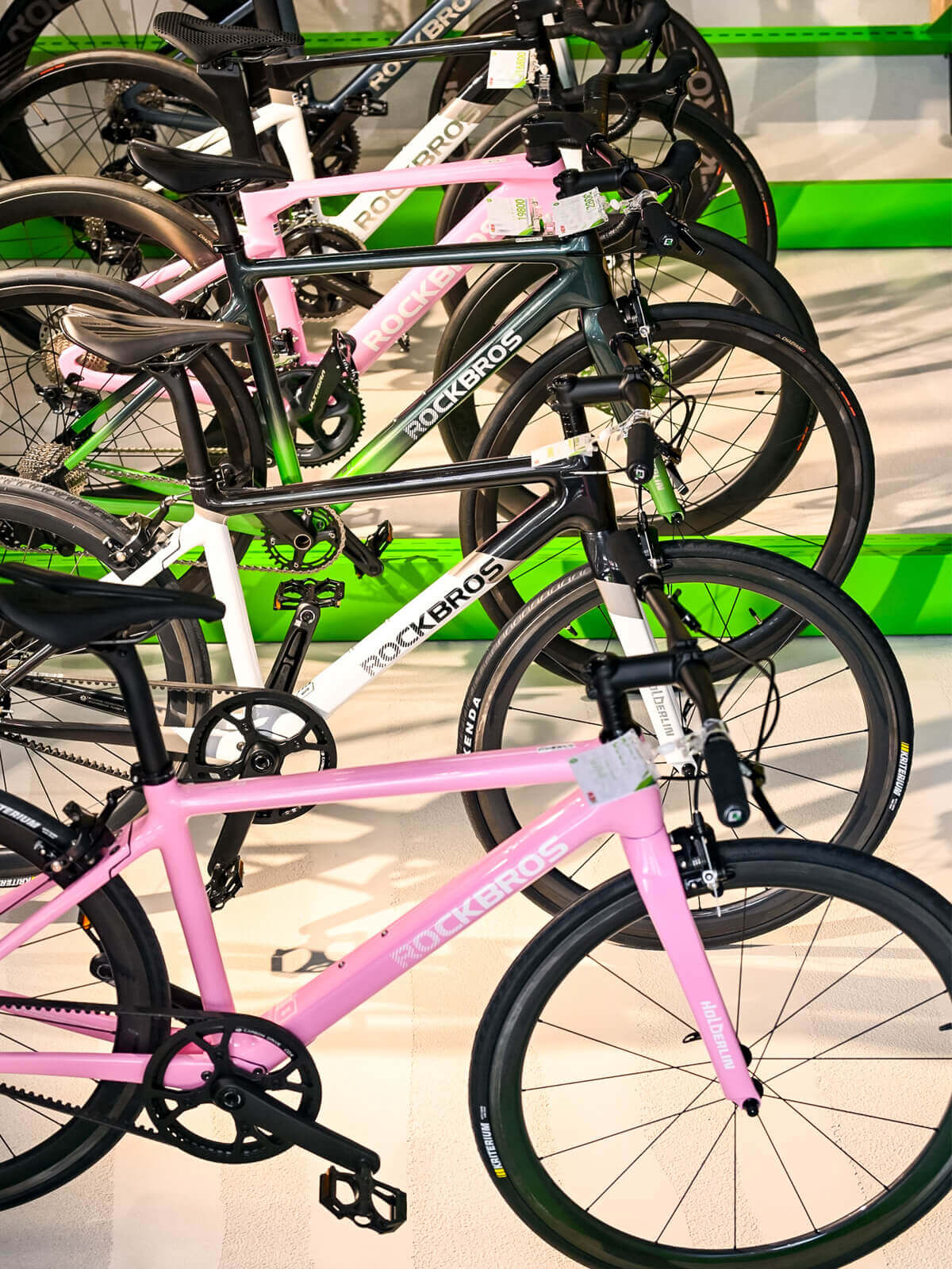 Customers test riding ROCKBROS road bikes in-store