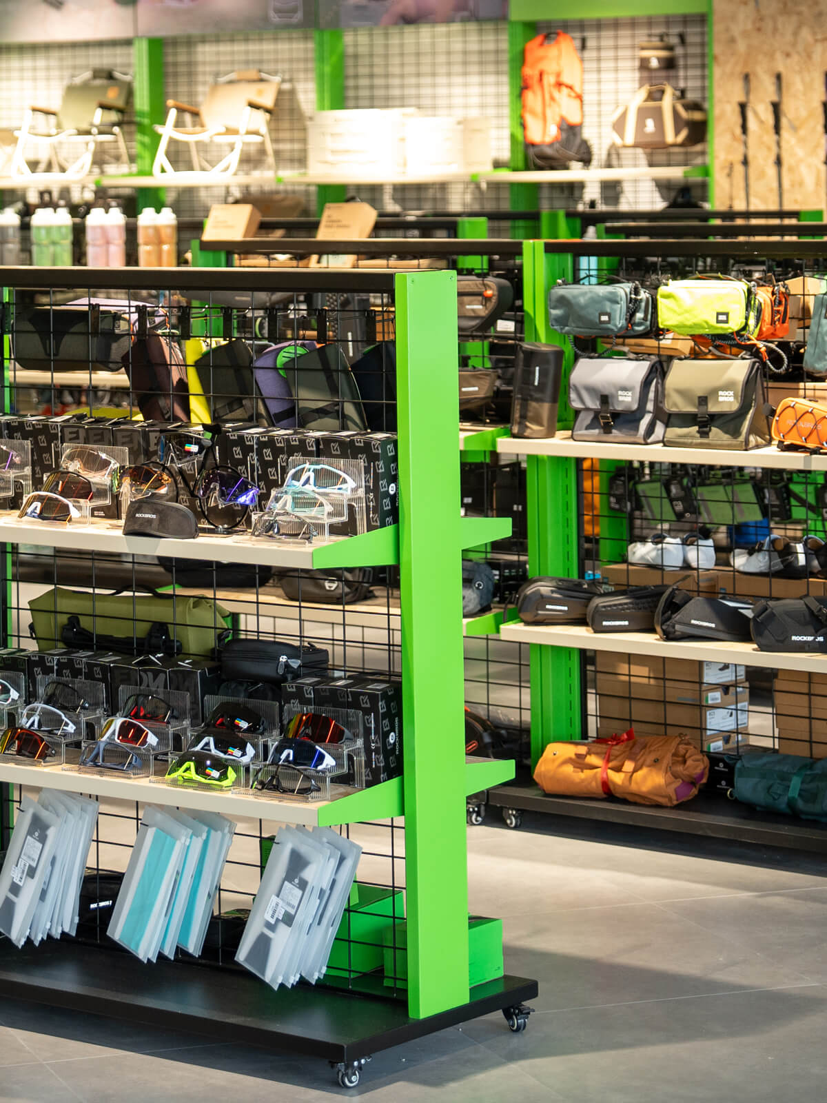 Cycling accessories including helmets, gloves, and handlebar bags