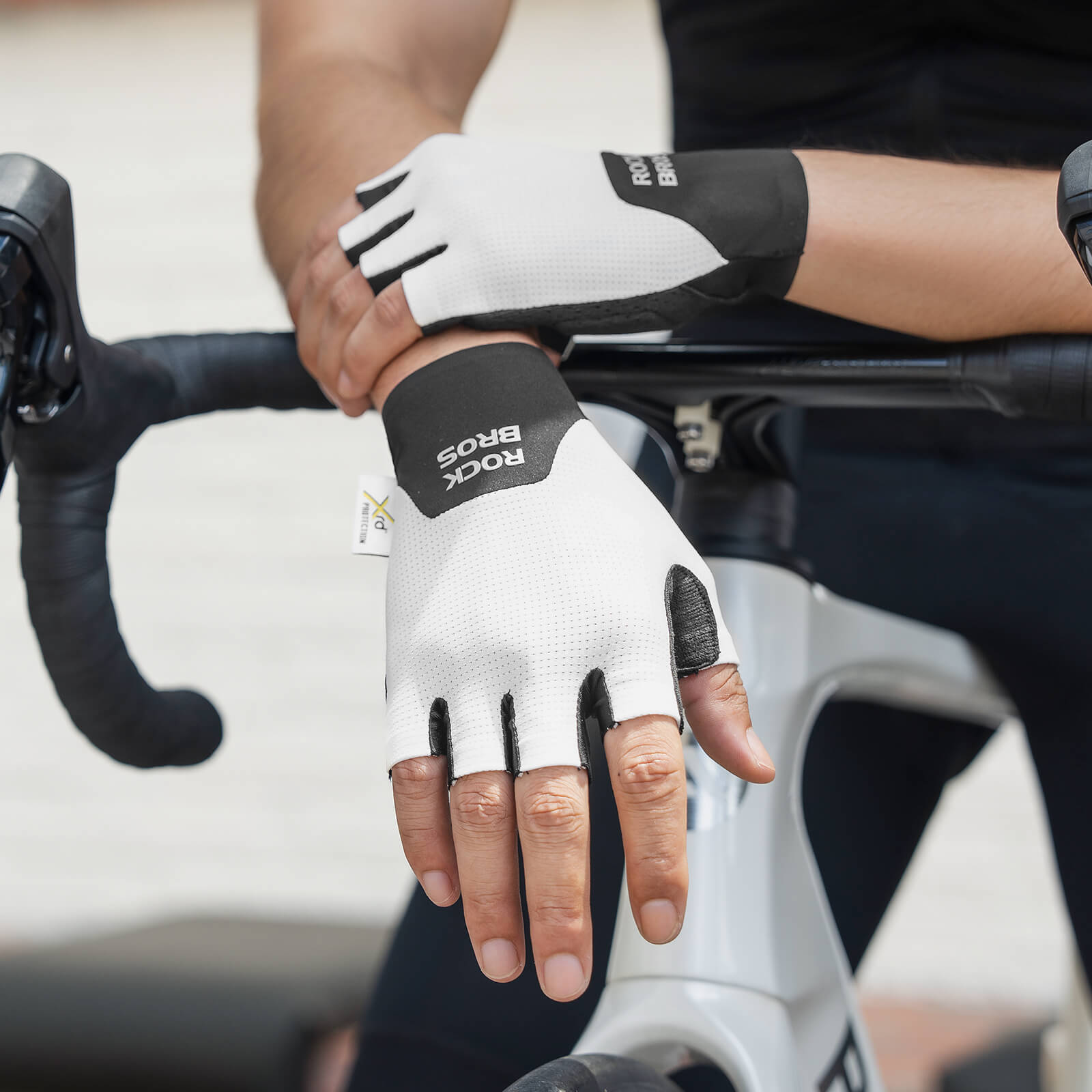 ROCKBROS Padded Half Finger Riding Gloves with Poron XRD Cushioning.
#color_white