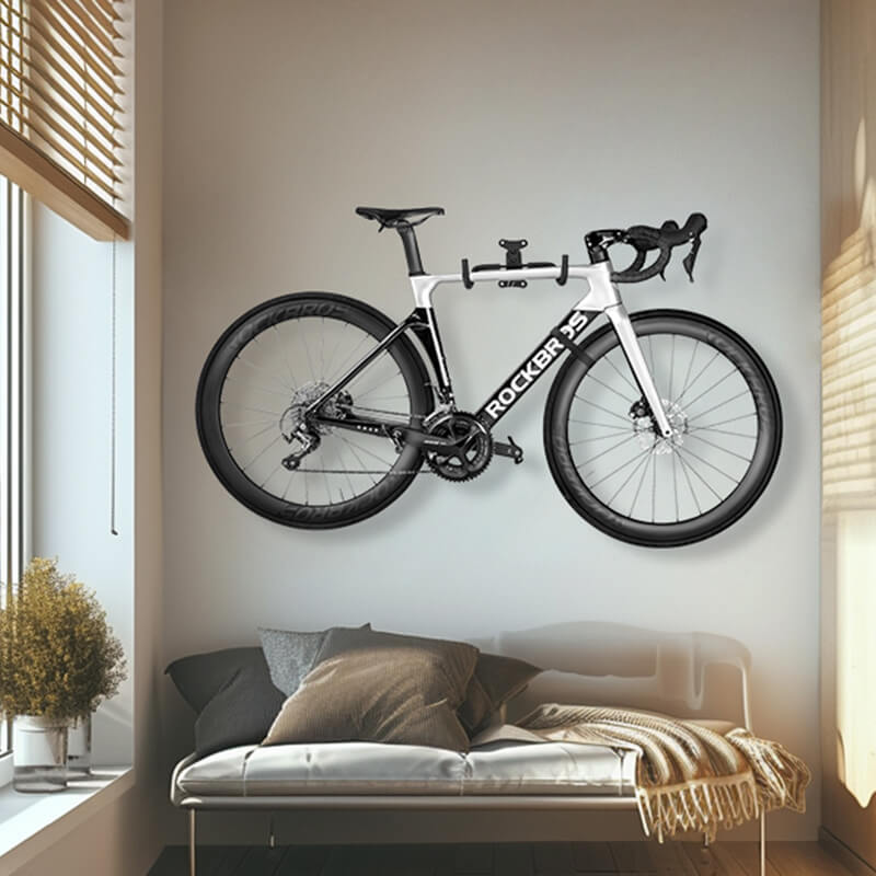 ROCKBROS retractable wall mount bike hook for bicycle storage in garage.