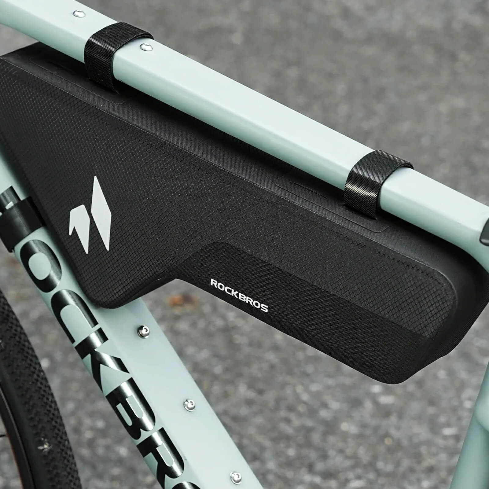 ROCKBROS rainproof bike bag protecting tools during rainy rides.
