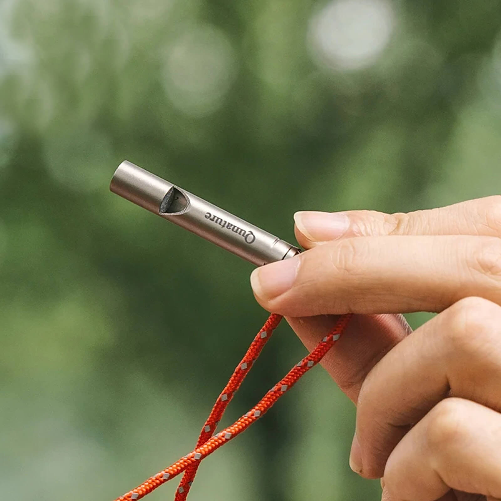 Rockbros 120dB titanium survival whistle for emergency signaling and personal safety.