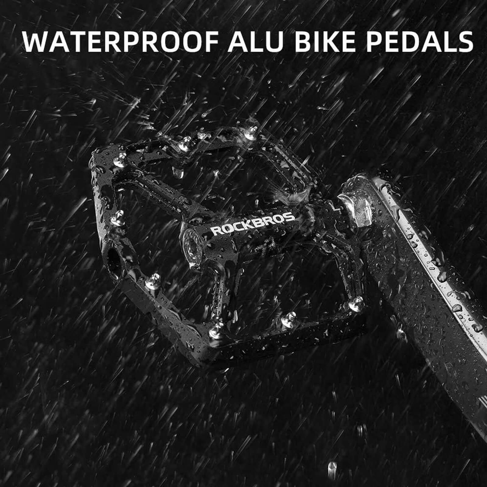 rockbros Ultra Lightweight Flat Bike Pedals mounted on bicycle crank arm.
#color_black