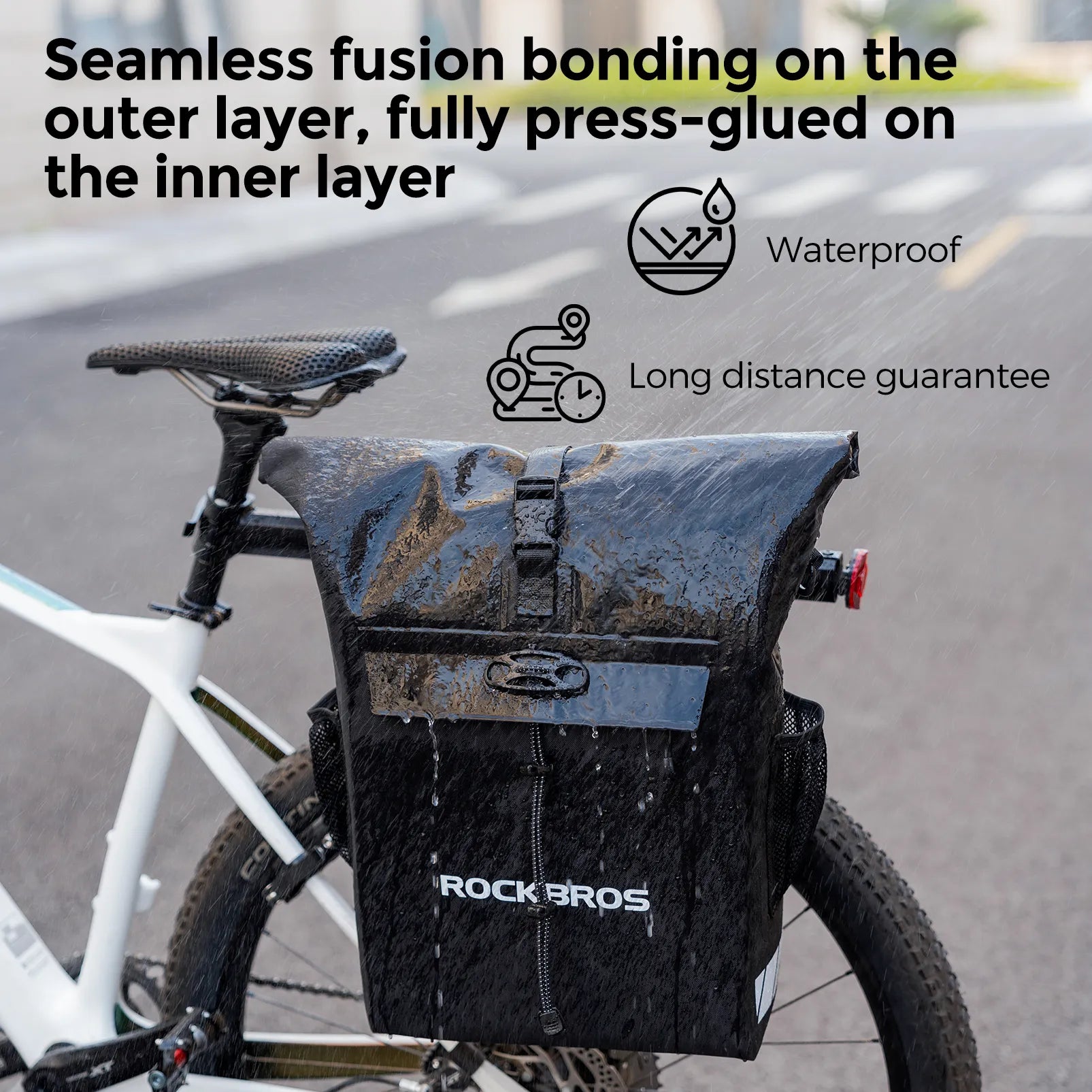 Rockbros 18L waterproof bike pannier bag in black with roll top closure mounted on rear rack