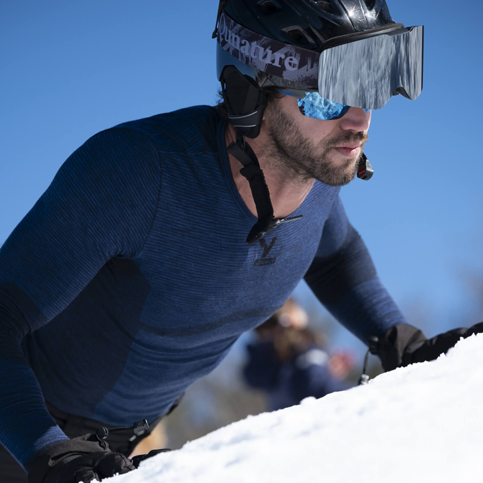 Skiing gear for winter sports including skis, helmets, and winter clothing.