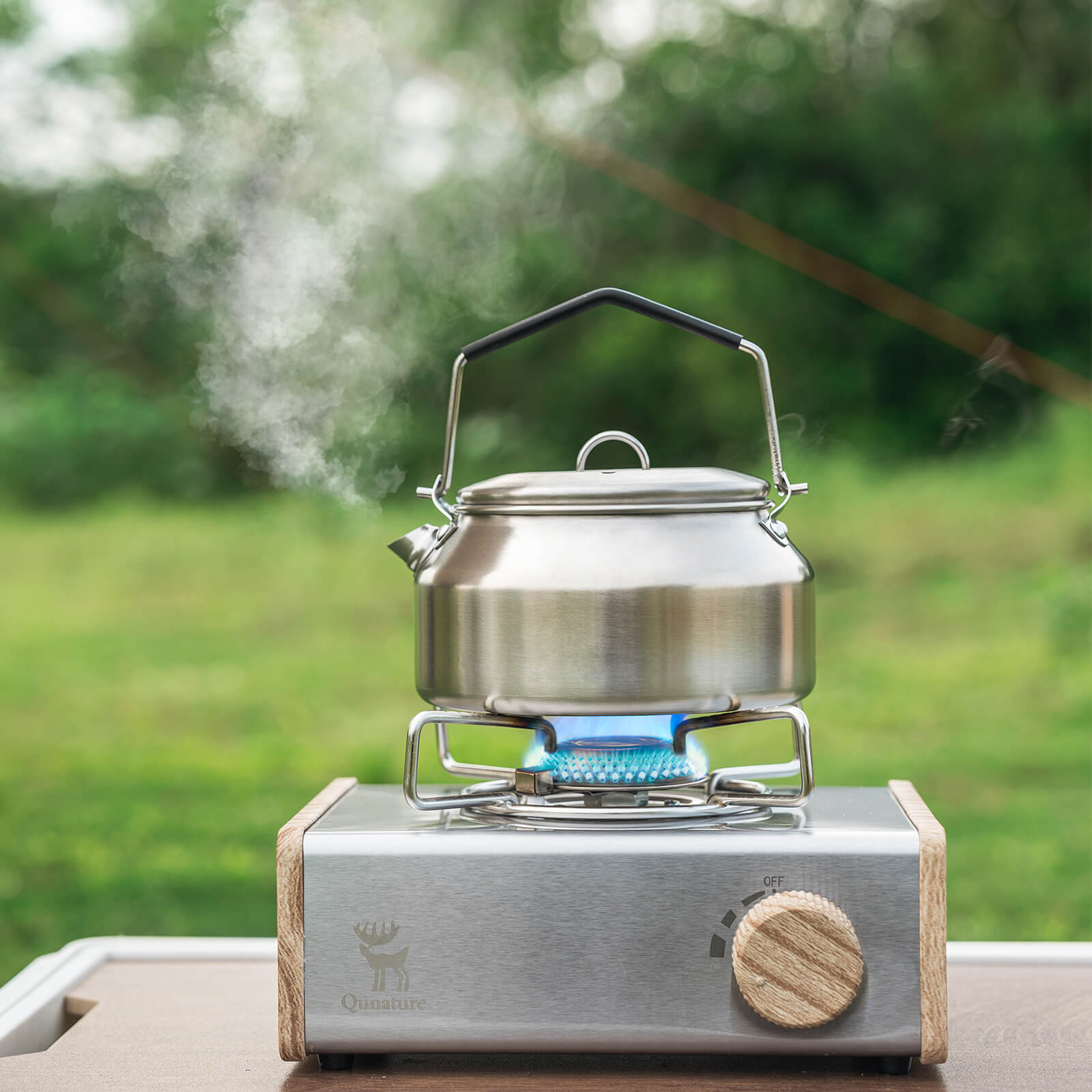 Qunature camping mini gas stove portable for outdoor cooking and travel.