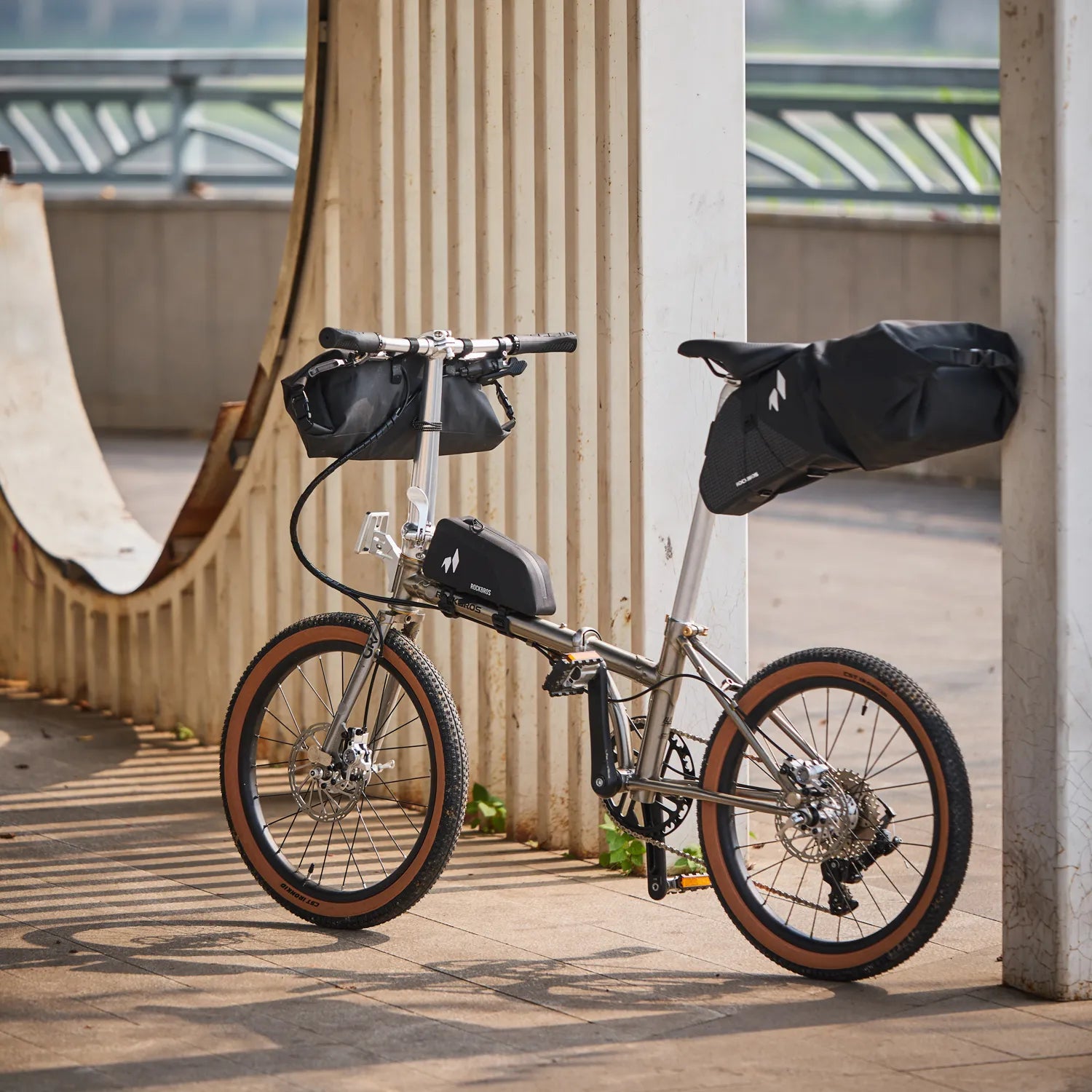 Side profile of the Rockbros Garvis 20 inch folding bike, showcasing the slim 4130 chromoly frame and 9-speed setup.