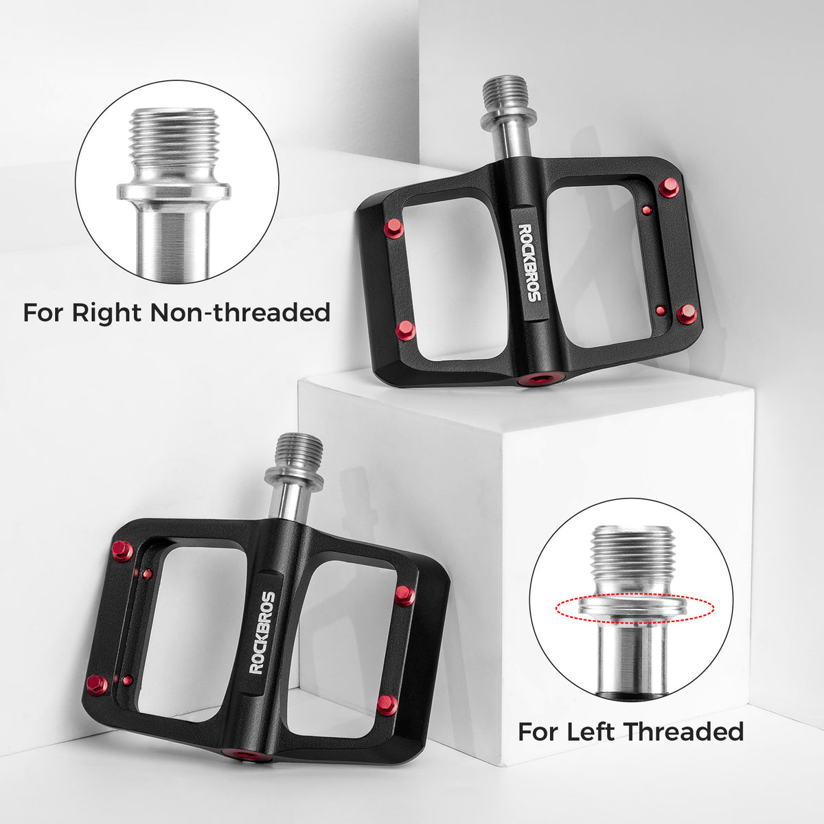 Pair of black ROCKBROS flat pedals with red traction pins and silver axles.
