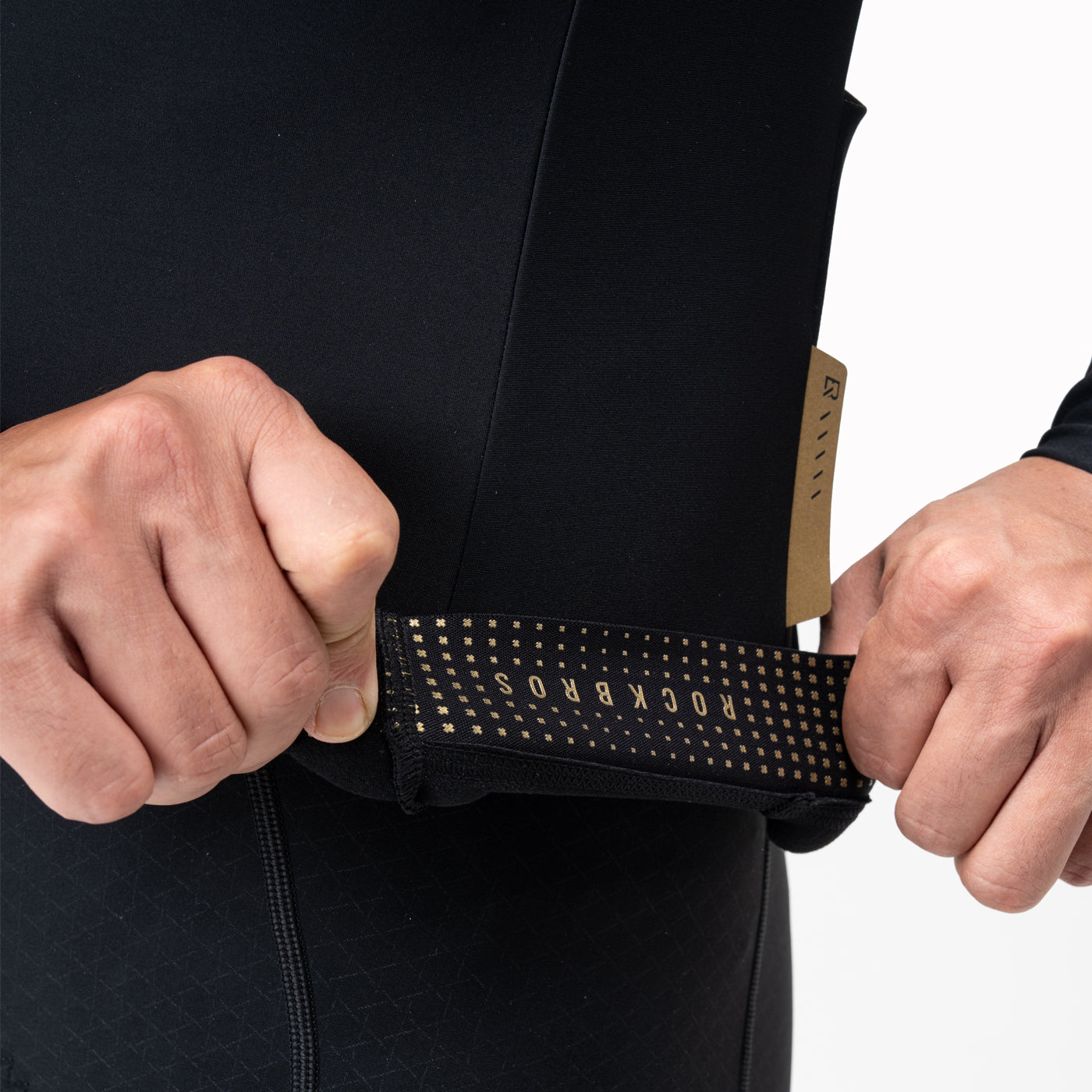 Cyclists show off the dynamic fit of the Rockbros Diamond Fit thermal top while riding on winter roads.