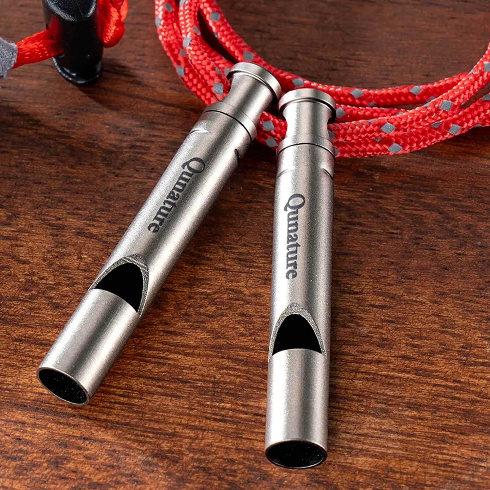 Rockbros 120dB titanium survival whistle for emergency signaling and personal safety.