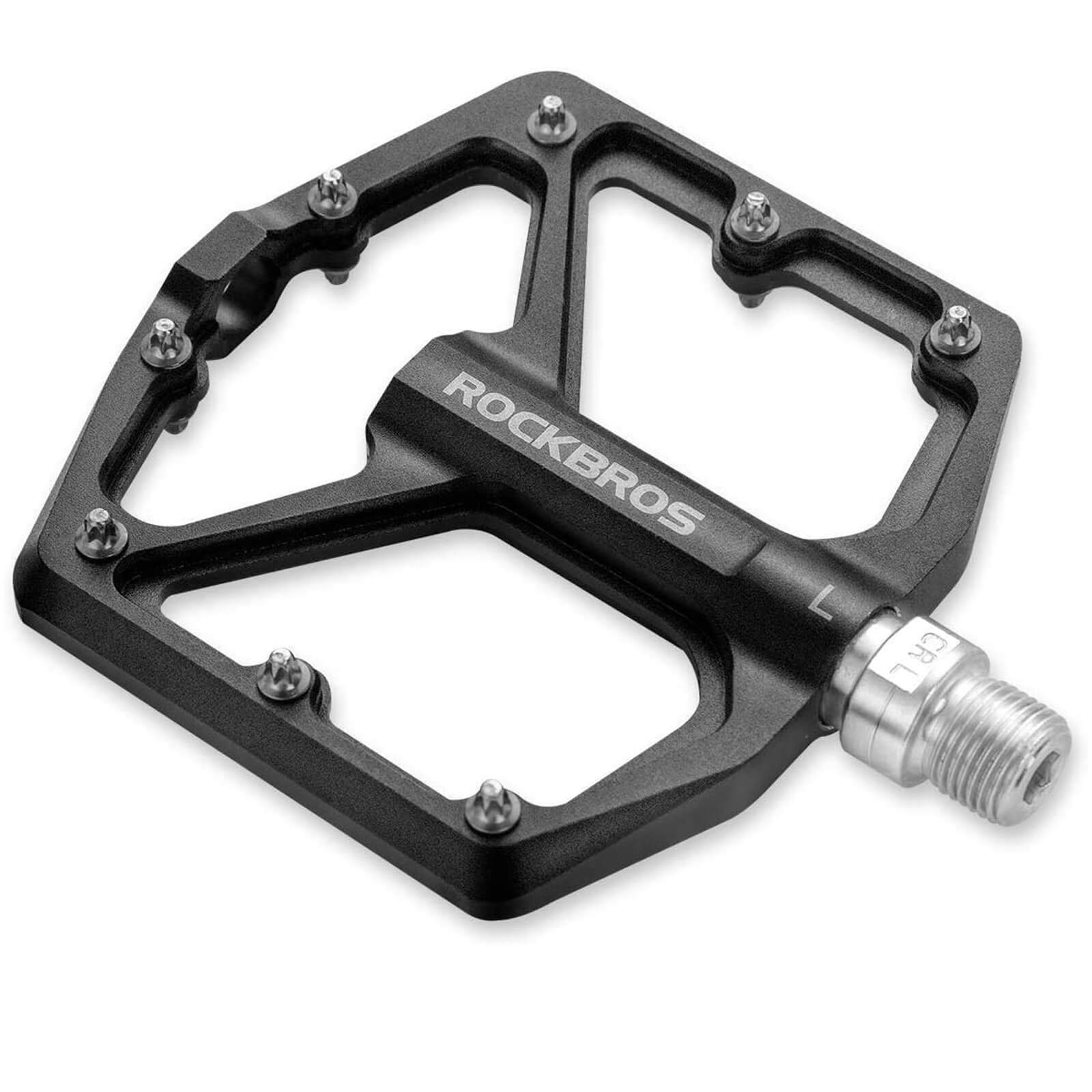 rockbros Ultra Lightweight Flat Bike Pedals mounted on bicycle crank arm.
#color_black