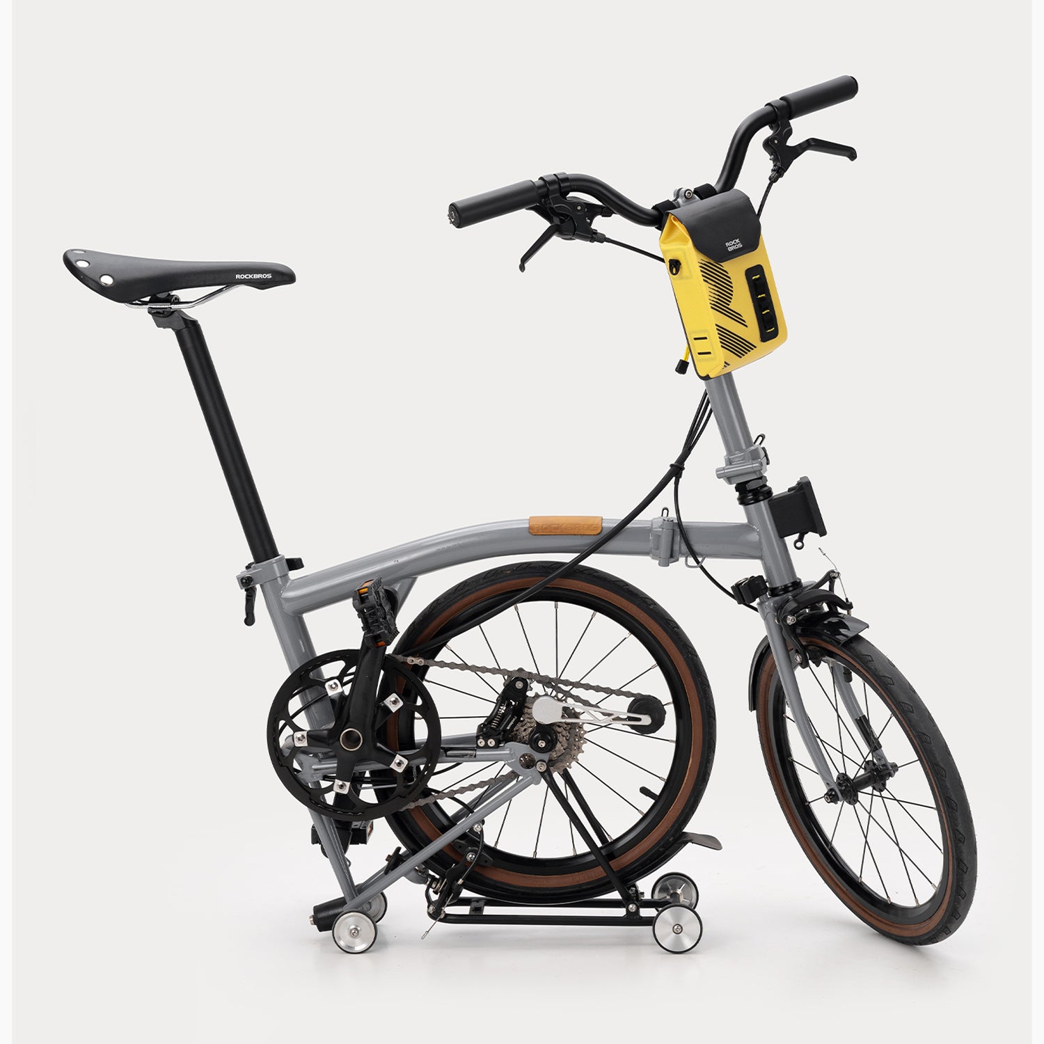 ROCKBROS waterproof magnetic handlebar bag 1.3L in high-vis yellow for bike packing.